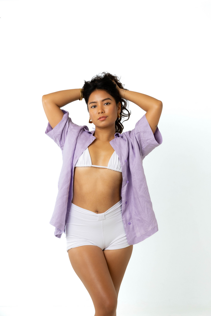 model wears size 6/8 linen shirt and shorts set in lilac